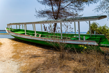 Wooden boats on the beach of a small tropical island (Gili Air, Indonesia)の写真素材