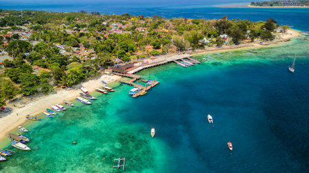 Aerial view of a busy tourist port area on a small tropical island (Gili Air, Lombok, Indonesia)の写真素材
