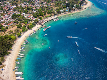 Aerial view of a busy tourist port area on a small tropical island (Gili Air, Lombok, Indonesia)の写真素材