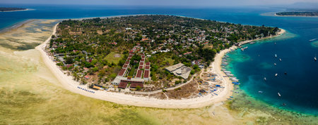 Aerial view of a large reef flat (table) of a fringing coral reef in Indonesiaの写真素材