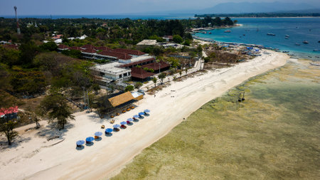Aerial view of a large reef flat (table) of a fringing coral reef in Indonesiaの写真素材