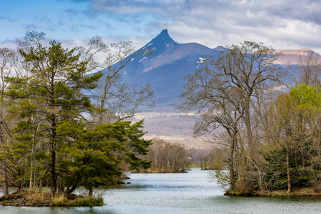 Active volcano Mount Komagatake and Lake Onuma in Hokkaido, Japanの写真素材