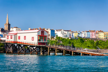 Colorful buildings along the seafront of the Welsh coastal town of Tenbyの写真素材