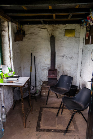 GRWYNE FAWR, WALES - AUGUST 01 2024: Interior of the smallest Bothy (mountain shelter) hit in the UK (Brecon Beacons National Park)のeditorial素材