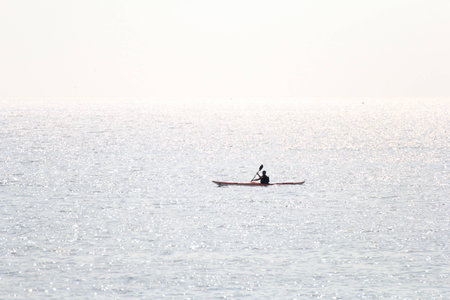 Sail boat at sea single playの写真素材