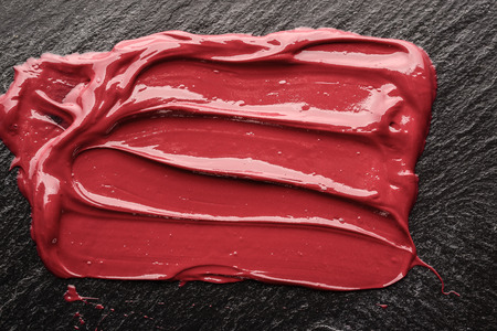 Lipstick, cosmetic product for painting and protection of lips.