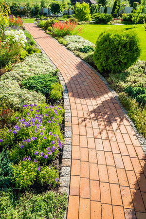 beautiful landscaping with beautiful plants and flowersの写真素材