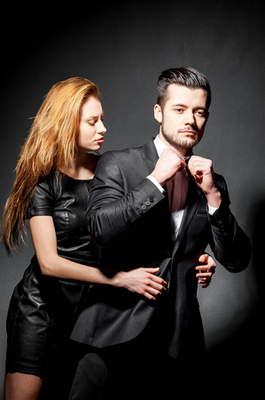 Hipster smiling boy and girl. Bearded young man blonde modelの写真素材