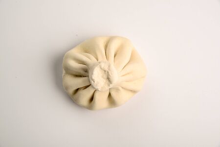Georgian dumplings Khinkali with meat, frozen productの写真素材