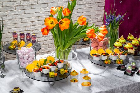 Candy bar, delicious fruit desserts in a restaurantの写真素材