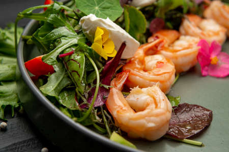 Fresh summer salad with shrimp, avocado, tomato cherry and cream cheeseの写真素材