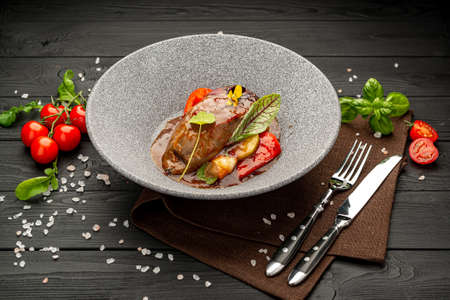 Beef tongue steak with vegetablesの写真素材