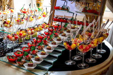 Served table before the holiday in the restaurant. Beautiful interior for a holidayの写真素材