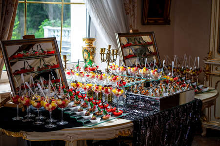 Served table before the holiday in the restaurant. Beautiful interior for a holidayの写真素材