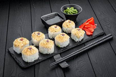 Sushi roll volcano, rolls with fish and cheese. Serving rolls in a restaurantの写真素材