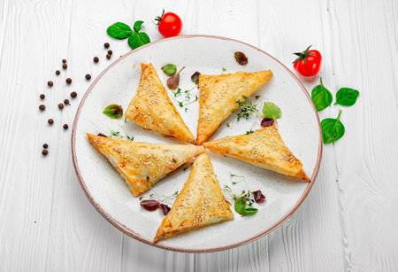 Fresh pies with meat and sesame seeds. Serving food in a restaurant. Photo for the menuの写真素材