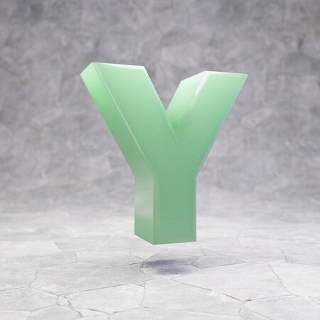 Jade letter Y uppercase on rocky backgrond. 3D rendered jade gemstone font. Best for jewelry advertising, anniversary, celebration.の写真素材