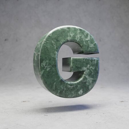 Green marble letter G uppercase on concrete background. 3d rendered glossy stone font character.の写真素材
