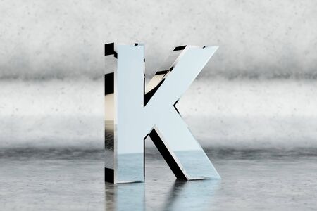 Chrome 3d letter K uppercase. Glossy chrome letter on scratched metal background. Metallic alphabet with studio light reflections. 3d rendered font character.の写真素材