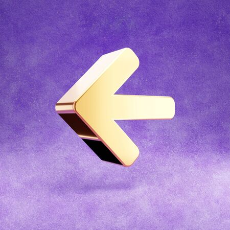 Arrow left icon. Gold glossy Arrow left symbol isolated on violet velvet background.の写真素材