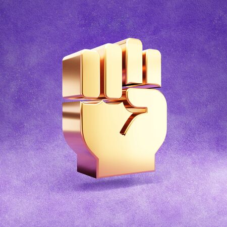 Fist icon. Gold glossy Fist symbol isolated on violet velvet background.の写真素材