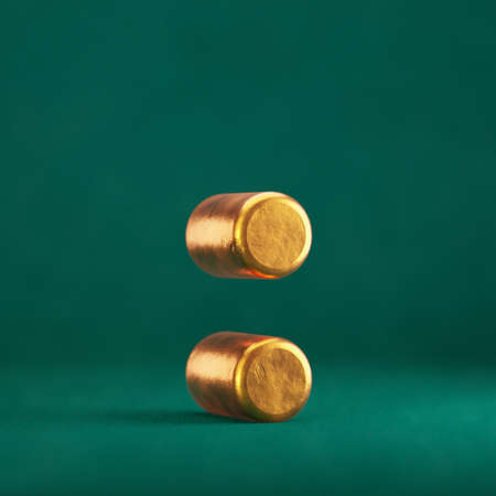 Fortuna Gold Colon on Tidewater Green background. Trend color font type symbol. 3d render.