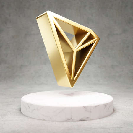 Tron cryptocurrency icon. Gold 3d rendered Tron symbol on white marble podium.