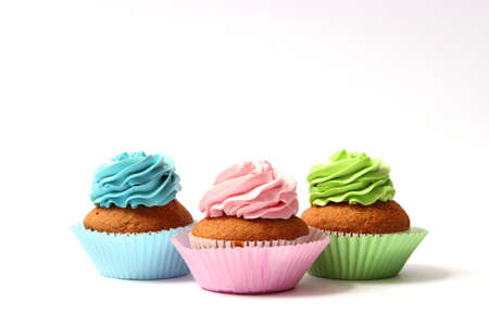 tasty cupcakes on a white background.の写真素材