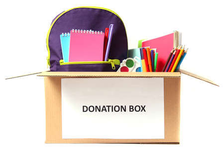 donation box with school stationery items isolated on whiteの写真素材