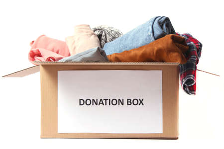 donation box with clothes isolated on whiteの写真素材
