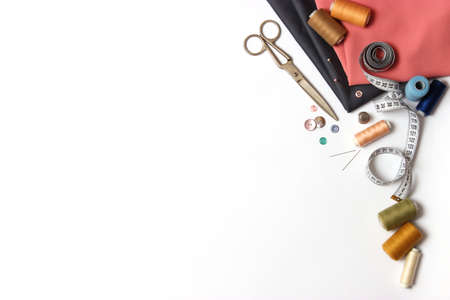 Set of different sewing accessories on a white background close-upの写真素材