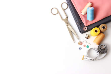 Set of different sewing accessories on a white background close-upの写真素材