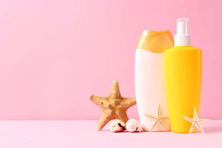 sunscreens on a colored background. Protection of the skinの写真素材