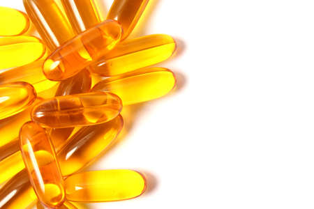 Omega-3 capsules on a white background. Fish oil, healthy supplementsの写真素材