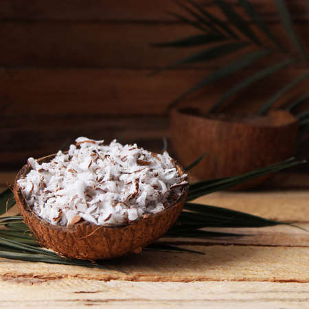 natural coconut flakes on the table close-upの写真素材