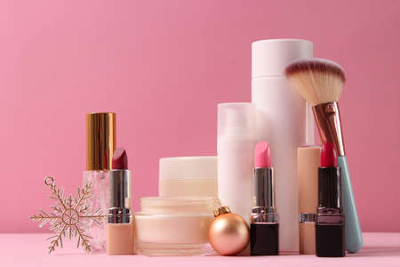 Set of professional decorative cosmetics and Christmas accessoriesの写真素材
