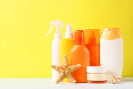sunscreens on a colored background. Protection of the skinの写真素材
