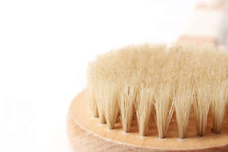 brush for dry massage on a white background isolated.の写真素材