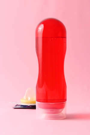 An intimate lubricant for comfortable sex close-up on a colored background.の写真素材