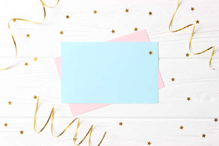 Light festive background with sparkles and ribbons with place for text.の写真素材