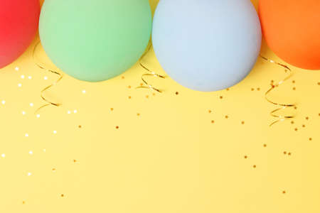 festive birthday background on colored background with place for textの写真素材