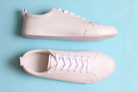 mens sneakers on a colored background. Mens footwear. minimalism.の写真素材