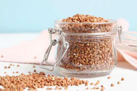raw buckwheat on a colored background.の写真素材