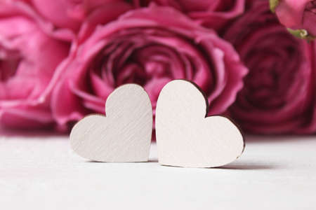 gift and flowers on a colored background. Holiday, give a gift, congratulationsの写真素材