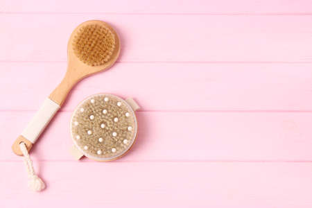 brush for dry massage on a colored background top view.の写真素材