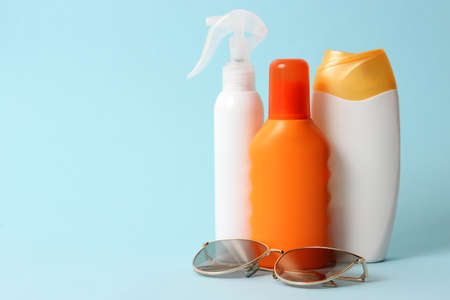 sunscreens on a colored background close-up. Sun protection for skin,の写真素材