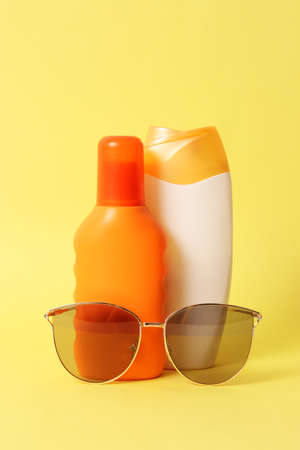 sunscreens on a colored background close-up. Sun protection for skin,の写真素材