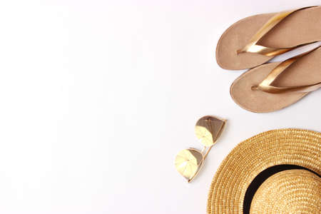 female slippers on a colored background top view. minimalism, womens shoes.の写真素材