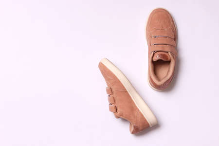 Childrens shoes on a light background top view. Childrens footwear.の写真素材
