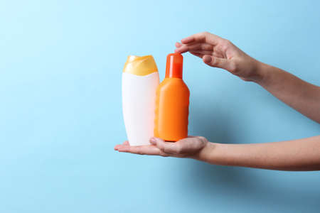 sunscreens on a colored background close-up. Sun protection for skin,の写真素材
